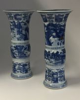 A pair of Chinese blue and white Gu vases, Qing Dynasty, Kangxi (1662-1722)