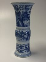 A pair of Chinese blue and white Gu vases, Qing Dynasty, Kangxi (1662-1722)