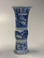 A pair of Chinese blue and white Gu vases, Qing Dynasty, Kangxi (1662-1722)