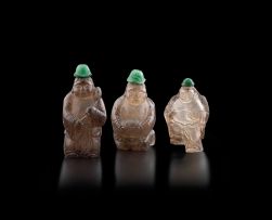 Three Chinese smoky crystal snuff bottles in the form of Immortals, 20th century