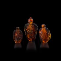 Three Chinese amber snuff bottles, early 20th century