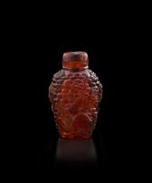A Chinese amber snuff bottle, early 20th century