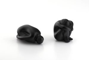 Two René Lalique black crystal crouching figurines, modern