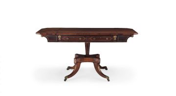 A Regency rosewood and brass inlaid sofa table