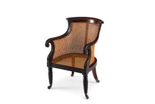A Regency mahogany and caned library chair
