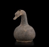 A Chinese grey earthenware goose-headed zun vessel, Western Han Dynasty, 206 B.C.– A.D. 9