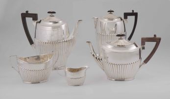 A George V silver four-piece coffee and tea service, James Dixon & Sons Ltd, Sheffield, 1910-1911