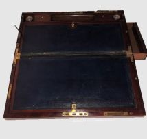 A Victorian mahogany and brass-bound travelling lap desk