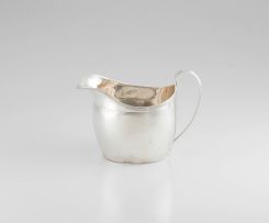 A George III silver cream jug, maker’s marks worn, London, 1805