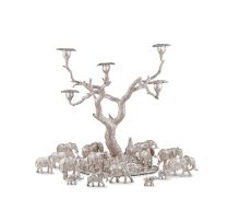 A silver 'Tree of Lights' candelabra and elephant herd table setting, Patrick Mavros, Harare, 2001-2005