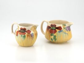 Two Clarice Cliff Bizarre ‘Nasturtium’ pattern jugs, 1930s