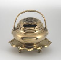An Oriental brass covered censor and stand, 20th century