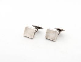 A pair of Georg Jensen silver cufflinks no. 84, designed by Flemming Eskildsen, Norway, with import marks for London, 1965