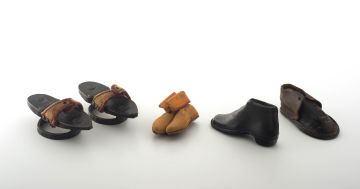 Three miniature leather boots, 19th century