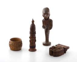 A carved wooden pipe stopper and stand, late 19th/early 20th century