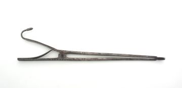 A pair of steel tongs, 19th century