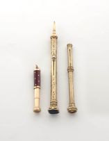 A late Victorian/early Edwardian 9ct gold propelling pen and pencil,