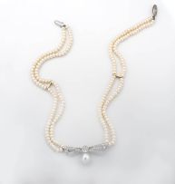 Diamond and baroque pearl pendant two-strand pearl necklace
