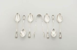An Edward VII cased set of six silver coffee spoons and a pair of silver sugar tongs, Elkington & Co Ltd, Birmingham, 1910