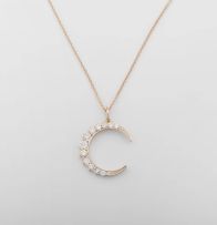 Diamond crescent-shaped pendant