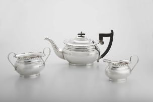 A George V three-piece silver tea service, Robert Stewart, Sheffield, 1935