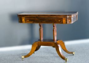 A late Regency rosewood and inlaid card table