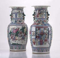 A pair of Chinese Canton ‘famille-rose’ vases, Qing Dynasty, 19th century