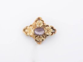A Victorian amethyst and gold brooch