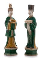 Two Chinese sancai-glazed earthenware figures of attendants, Ming Dynasty, 1368-1644