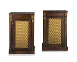 A pair of Regency rosewood side cupboards