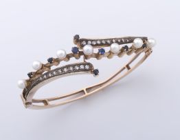 Edwardian diamond, blue sapphire and pearl bangle