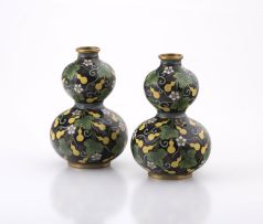 A pair of Chinese cloisonné enamel double-gourd vases, Qing Dynasty, late 19th / early 20th century