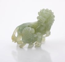 A Chinese jade carving of a Dog of Fo and pup, 20th century