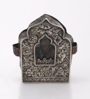 A Tibetan silvered metal, copper and brass portable ‘Gau’ (shrine)