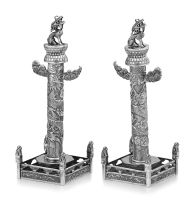 A pair of Chinese Export silver candlesticks, 19th century