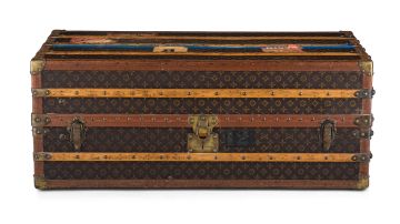 A Louis Vuitton wood and leather cabin trunk