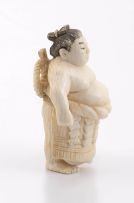 A Japanese ivory netsuke of a sumo wrestler, late Meiji period (1868-1912)