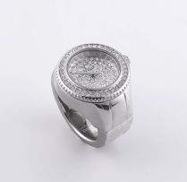 A stainless steel watch ring, modern