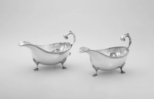 A pair of Victorian silver sauce boats, William Hutton & Sons, London, 1883