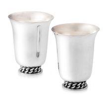 A pair of silvered brass beakers, designed by Jean Després, post 1948