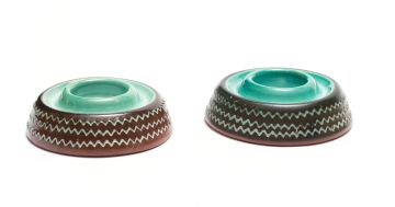 A pair of Kalahari earthenware candle holders