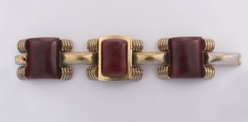 French gilt-metal and toffee-coloured bakelite bracelet, Nita Roya