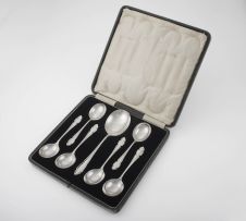 A George V silver cased set of seven ice-cream spoons, Cooper Brothers & Sons Ltd, Sheffield, 1926-1929