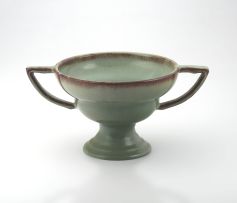 A Linn Ware green-glazed two-handled pedestal bowl