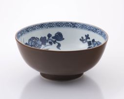 A Chinese blue and white café-au-lait 'Nanking Cargo' bowl, Qianlong period (1735-1796)