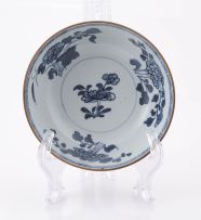 A Chinese blue and white café-au-lait 'Nanking Cargo' bowl, Qianlong period (1735-1796)