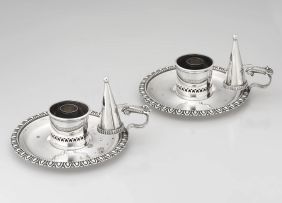 A pair of electroplated chambersticks and snuffers, late 19th/early 20th century
