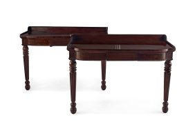 A pair of Regency mahogany console serving tables