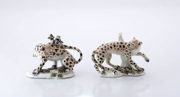 A pair of Staffordshire figures of leopards, possibly Derby, late 18th/early 19th century