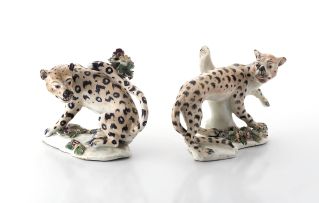 A pair of Staffordshire figures of leopards, possibly Derby, late 18th/early 19th century